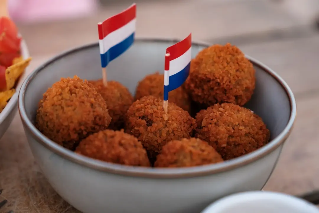 a bowl of food with a flag sticking out of it