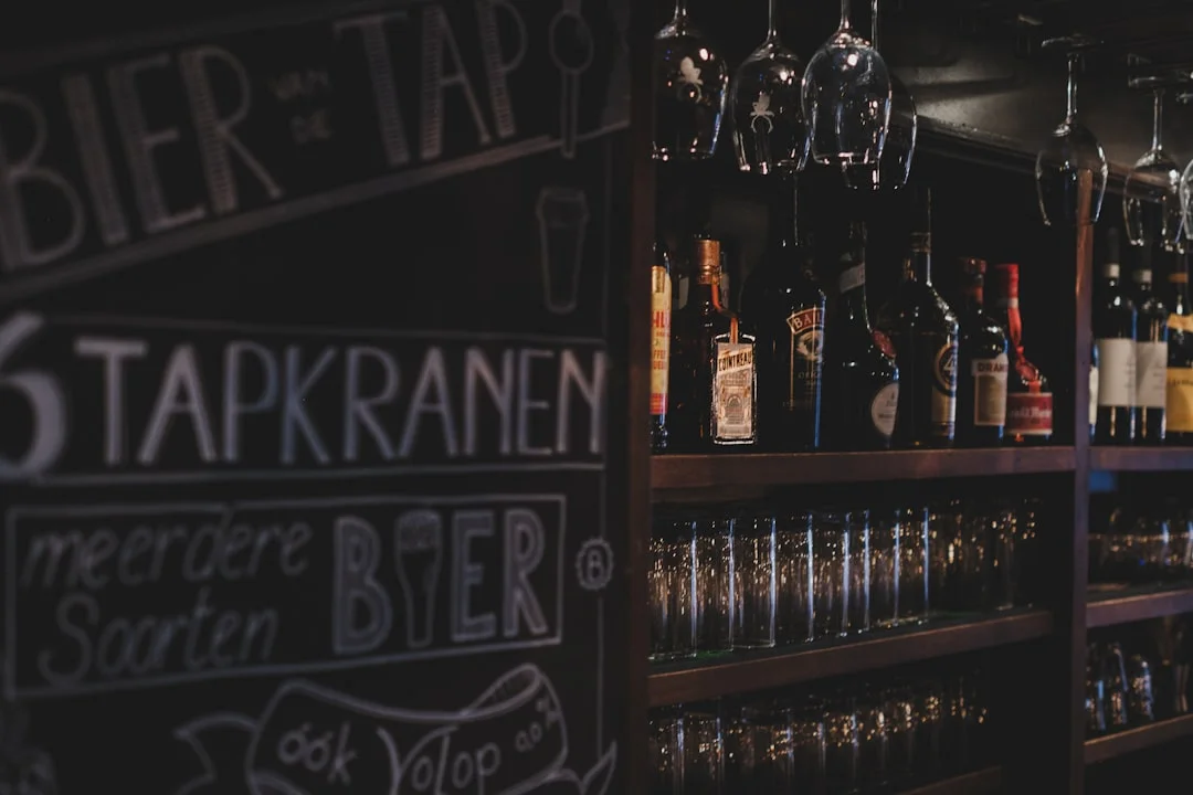 Bar interior with beer menu and glassware